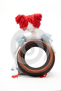 Vintage doll and frame