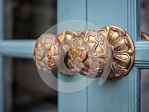 Vintage door knobs on wooden door