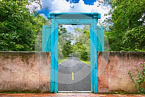 Vintage door with nature background and concept move out of the city to the nature for relax, Journey from the city to the nature