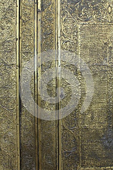 Vintage door with trim ornaments and forged metal details