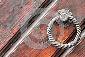 Vintage doorknob on antique door