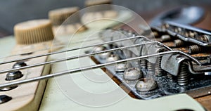 Vintage electric guitar strings and bridge