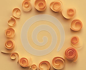 Vintage elegant background with paper wreath made of spirals and swirls, paper art; wedding, anniversary, birthday card concept