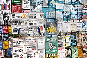 Vintage enamel signs at a shop at Portobello Road, London, UK