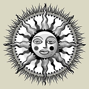 Vintage engraving stylized drawing of round decorative symbol of sun with face and rays