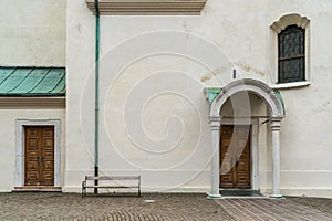 Vintage entrance door and facade of European style building in Cortina d`Ampezzo, Italy