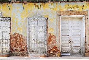 Vintage eroded facade in trinidad, cuba photo