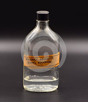 Vintage Ethanol Bottle on a Black Background