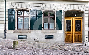 Vintage European style building facade with door and windows in Zurich, Switzerland