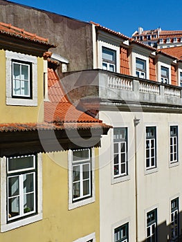Vintage facades on old-fashioned retro buildings on the hills of Lisbon, Portugal. Portuguese historical architecture