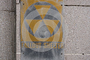 Vintage Fallout Shelter Sign on Concrete Wall