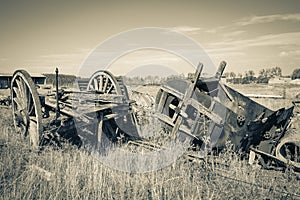 Vintage Farm Equipment - old chariot and an old hay baler