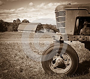 Vintage Farm Landscape with Tractor and Barn