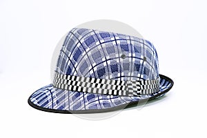 Vintage, felt trilby/fedora hat with plaid blue pattern on a white background.