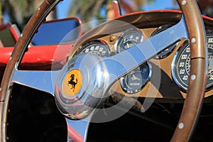 Vintage Ferrari racer steering wheel and cockpit