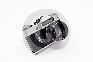 Vintage film camera, close-up on a white background, top view