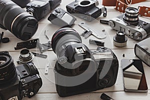 Vintage Film Camera, Digital Camera And Smartphone Technology Development Concept. Closeup