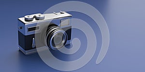 Vintage film photo camera isolated on blue color background. 3d illustration
