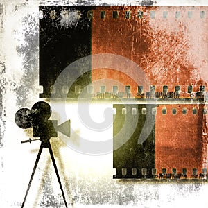 Vintage film strip background and old cinecamera