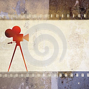 Vintage film strip background and old cinecamera