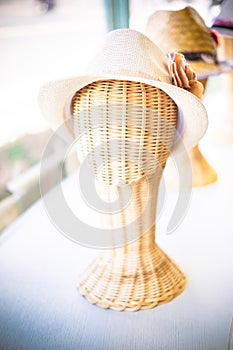 Vintage filter : lady hat on a wickerwork mannequin head