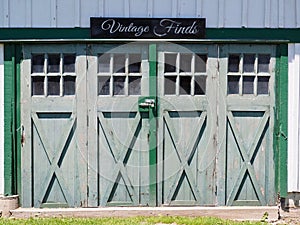 Vintage Finds Sign Above Old Country Barn Doors