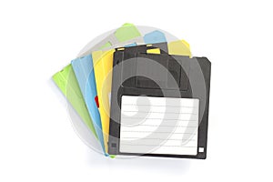 Vintage floppy disk magnetic computer on white background.