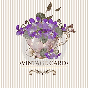 Vintage Floral Background with Violets in a Cup