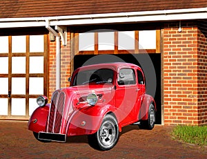 vintage ford anglia car on driveway