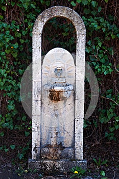 vintage fountain with drinking water