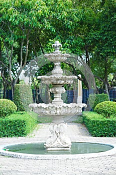 Vintage fountain. An old vintage park fountain in the outfoor garden