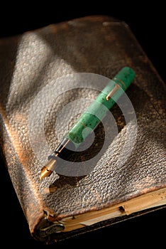Vintage Fountain Pen On Old Bible