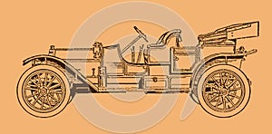 Vintage four-passenger touring roadster car in side view