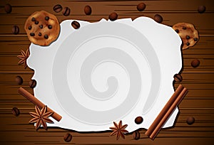 Vintage frame with cup of coffee, cinnamon, and biscuit on wooden table