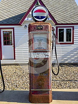 Vintage Rusted Gas Pump from Days Past