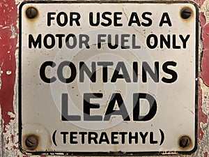 Vintage gas pump lead tetraethyl sign environment