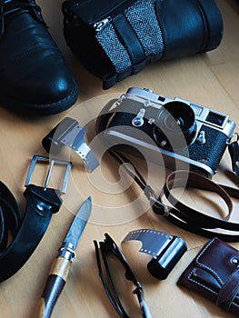 Vintage gear still life , shoes, belt, camera, sunglasses, wallet