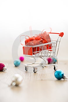 Vintage gift box in shopping cart