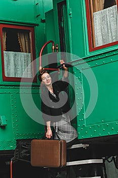 Girl says goodbye on rail platform