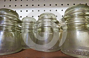 Vintage glass electric insulators.