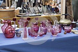 Vintage glass items made of red and pink glass - vases, glasses and jugs