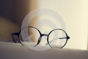 Vintage glasses on a bed