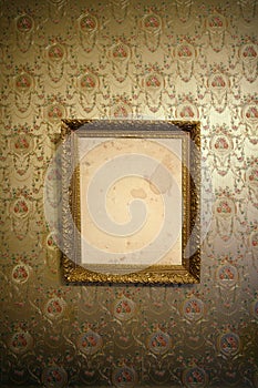 Vintage gold frame and wallpaper