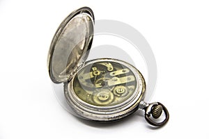 Vintage golden old pocket watch on white background. Old mechanism inside watch