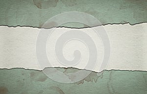 Vintage green paper background with stripe and dirty stains