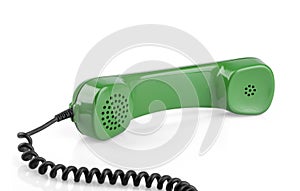 Vintage green telephone handset isolated on white background. File contains a path to isolation