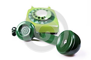 Vintage green telephone receiver earpiece