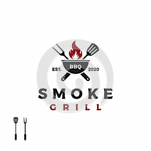 Vintage Grill Barbeque barbecue bbq with crossed fork and spatula with fire flame Logo design