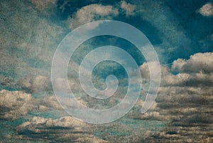 Vintage grunge background of sky with clouds