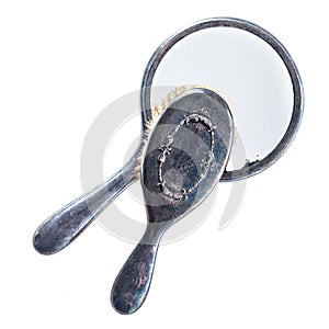 Vintage grunge hairbrush and hand mirror